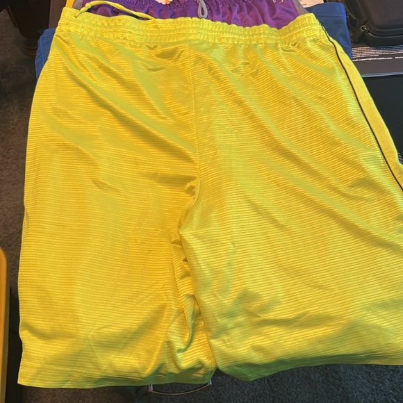 3 pairs of Nike shorts one purple one blue cut offe one flouresant yellow - Picture 9 of 9